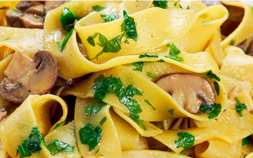 Fresh Fettuccine with Mushrooms, Greens, and Walnuts 