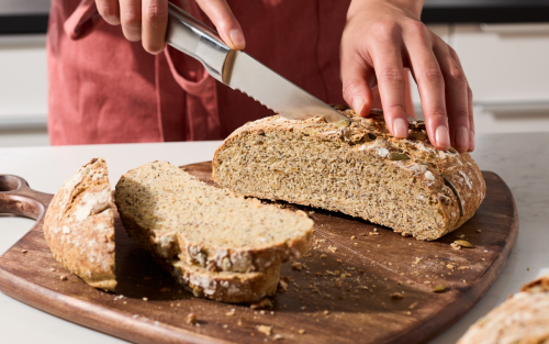 Cutting a homemade seed bread