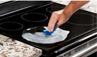 polish Cleaning cooktop.