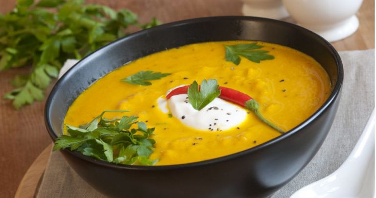 A bowl of curried coconut soup